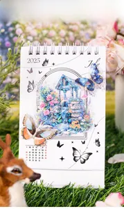Close-up of 2025 creative calendar July page with butterfly and garden illustration