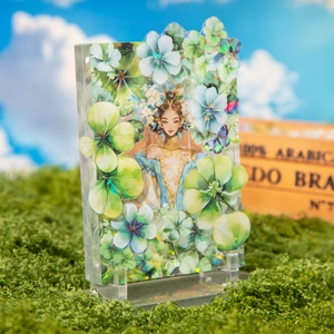 Exquisite acrylic fairy stand with intricate floral layers and a transparent base