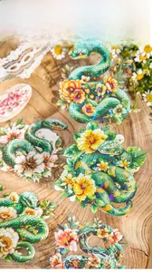 Detail of snake and floral stickers with double white ink and laser holographic finish