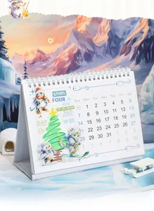 Close-up of a cozy winter cartoon desk calendar with animals and spiral binding