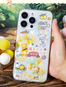 Close-up of clear TPU iPhone case with cute cartoon bear and balloon PET stickers