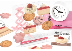 Detailed view of bakery-themed sticky notes featuring cookies and cake shapes for journaling