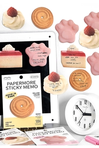Detailed view of 30 sheets realistic dessert sticky notes in bakery themes on a desk