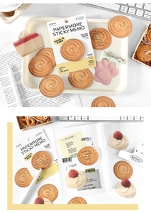 Detailed view of realistic butter cookie-shaped sticky notes for scrapbooking and journaling