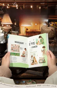 Dettaglio di adesivi PET a tema carriera applicati su una pagina di diario vintage