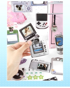 Y2K vintage electronics sticker pack featuring retro camera and gaming console designs