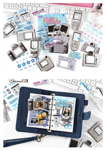 Detail showing vintage gadget stickers on a denim binder with retro camera and phone designs