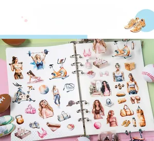 Detailed view of fitness themed PET stickers and sports illustrations in a planner