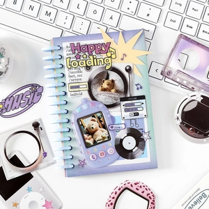 Y2K style spiral notebook featuring vintage illustrations of electronics and teddy bears