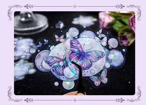 Macro detail of holographic purple butterfly stickers with shimmering laser effect