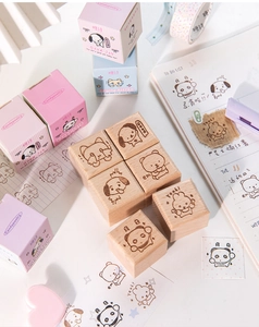 Close-up of cute animal beech wood stamps with creative packaging and panda patterns