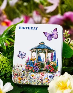 Floral tin box detail with garden scenery butterfly and birthday theme illustration