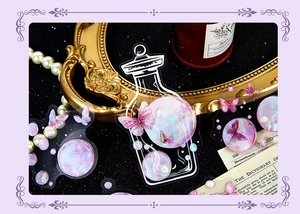 Macro detail of butterfly PET stickers with iridescent laser finish and vintage aesthetic