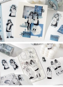 Detail of vintage salt-style PET tape and anime girl stickers for DIY scrapbooking