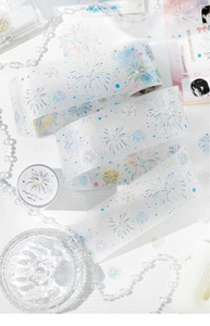 Macro view of PET decorative tape featuring glitter fireworks and dreamy aesthetics
