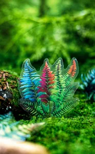 Close-up of transparent fern leaf PET stickers with vibrant veins for scrapbooking DIY