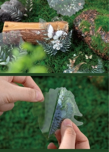 Macro detail of waterproof PET stickers with butterfly and fern leaf nature designs