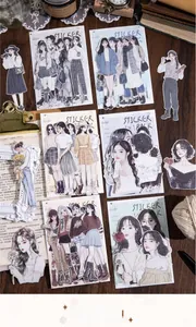Détails d'autocollants rétro de personnages féminins sur un bureau en bois vintage