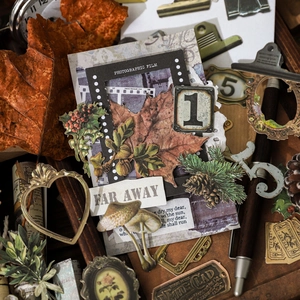 Retro DIY stickers set featuring autumn leaves and vintage film frames on wood table