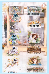 Detailed macro view of PET floral decorative tape with astronaut and piano motifs