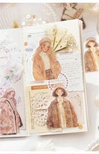 Macro detail of retro girl PET stickers for DIY scrapbooking with vintage floral borders