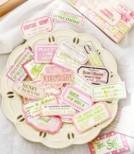 Retro matchbox style stationery stickers with colorful vintage typography and labels