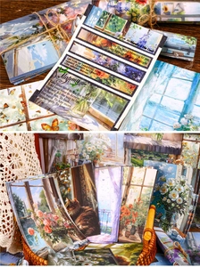 Detailed view of vintage oil painting style scrapbooking papers with floral and window themes