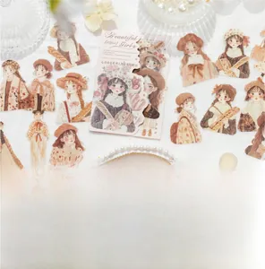 Detailed view of vintage autumn girl PET stickers spread on white lace with pearl decor