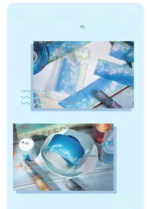 Detail view of blue sky and cloud themed washi tape stickers for DIY stationery decoration