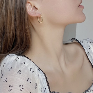 Boucles d'oreilles minimalistes en argent sterling S925 torsadé au design goutte d'or