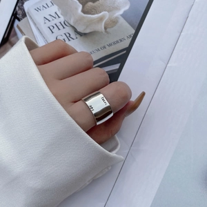 Minimalist S925 sterling silver wide band ring with Ideal engraving worn on finger