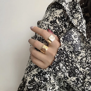 Minimalist wide geometric s925 silver rings with mirror finish on model hand