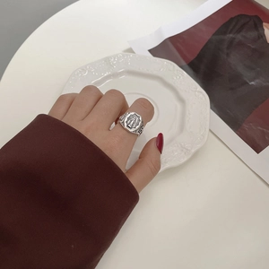 Detailed view of vintage S925 sterling silver Virgin Mary ring with retro relief design