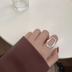 Minimalist S925 sterling silver hollow oval irregular geometric ring on index finger