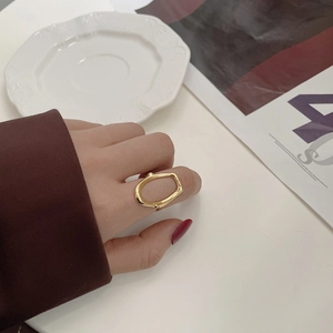 Minimalist S925 sterling silver hollow oval ring with a unique melted aesthetic for women