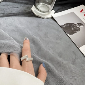 Minimalist geometric S925 sterling silver ring with rectangular design worn on index finger
