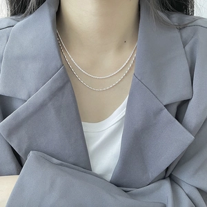 Zweilagige S925 Sterlingsilber Kette mit schimmernder Gypsophila und Wellen-Design