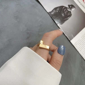 Minimalist S925 sterling silver ring with geometric double square design on model hand