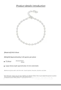 Detail of 925 sterling silver grain chain with lobster clasp and adjustable extension