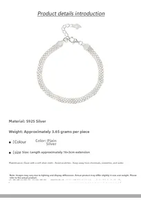 Detailed macro view of S925 sterling silver mesh bracelet with heart charm and lobster clasp