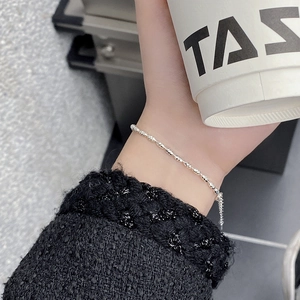 Elegant 925 sterling silver rice bead bracelet with adjustable extender on female wrist