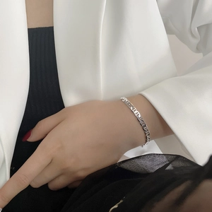S925 sterling silver pig nose anchor chain bracelet worn with casual professional outfit