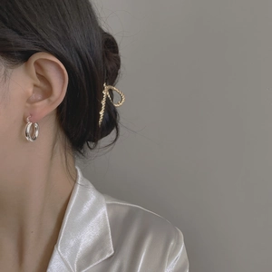 Polished S925 sterling silver hoop earrings with minimalist high-shine metallic finish