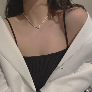 Sparkling S925 sterling silver heart pendant necklace with shimmering zircon pavé on model