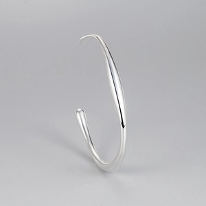 Minimalist S925 sterling silver open bangle featuring a polished irregular fluid design