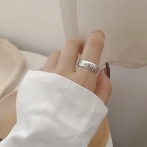 Detailed view of vintage S925 silver ring featuring embossed sacred Buddhist scriptures