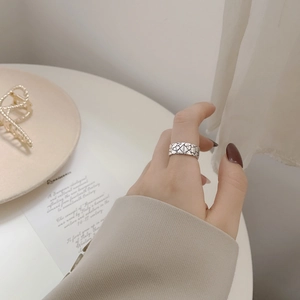 Retro 925 sterling silver wide band ring with irregular stone crack texture worn on hand
