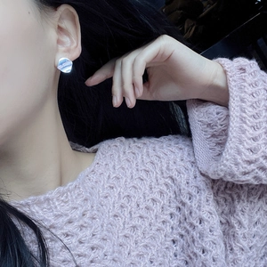 Minimalist S925 sterling silver geometric stud earrings with ripple texture on model