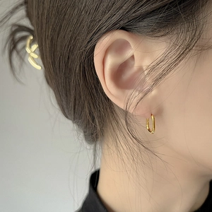 Minimalist S925 silver golden rectangular hoop earrings shown on a female model