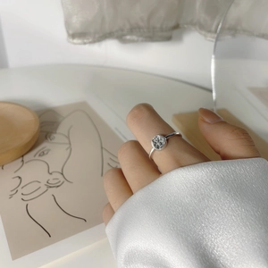 Vintage S925 sterling silver bear relief ring shown on model in a minimalist setting